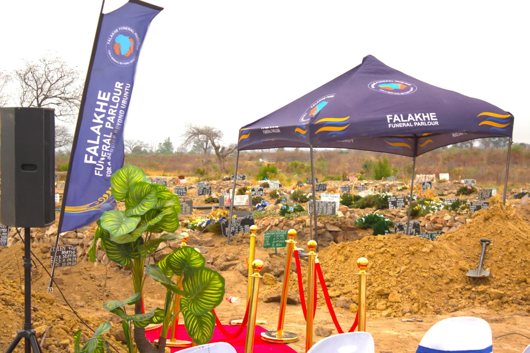 A Falakhe gazebo and banner set up at the graveside