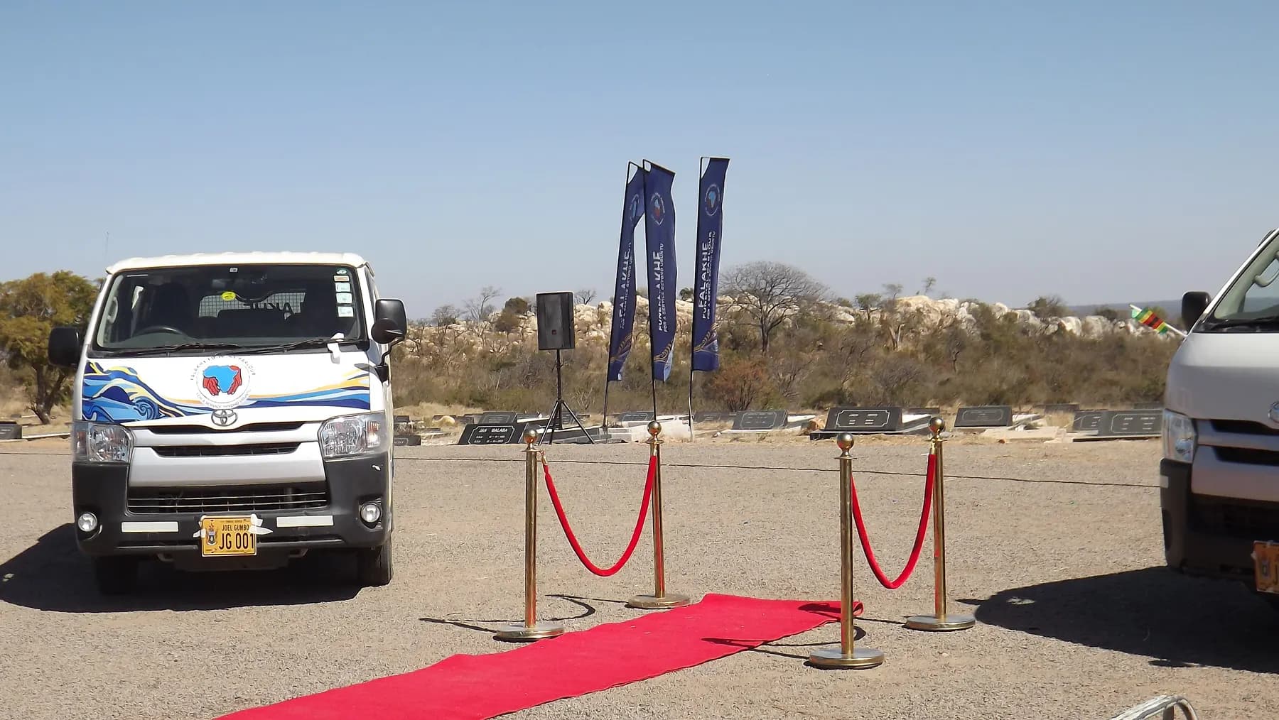 Falakhe vehicles beside a red carpet